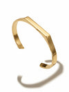 Gold bracelet on a white background