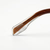 Clear hairbrush with brown bristles on a white background