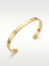 Gold bracelet on a white background
