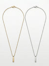 Two necklaces, one gold and one silver, on a white background