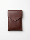 Brown leather pouch on a white background