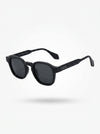 Black sunglasses with a brand logo on a white background