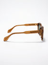 Brown sunglasses with a subtle pattern on a white background