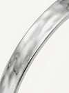 Close-up of a silver ring on a white background