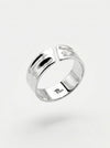Silver ring with 'TUCC' branding on a light gray background
