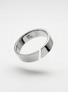 Silver ring with a geometric design on a white background