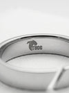 Silver ring with 'TUCC' branding on a white background